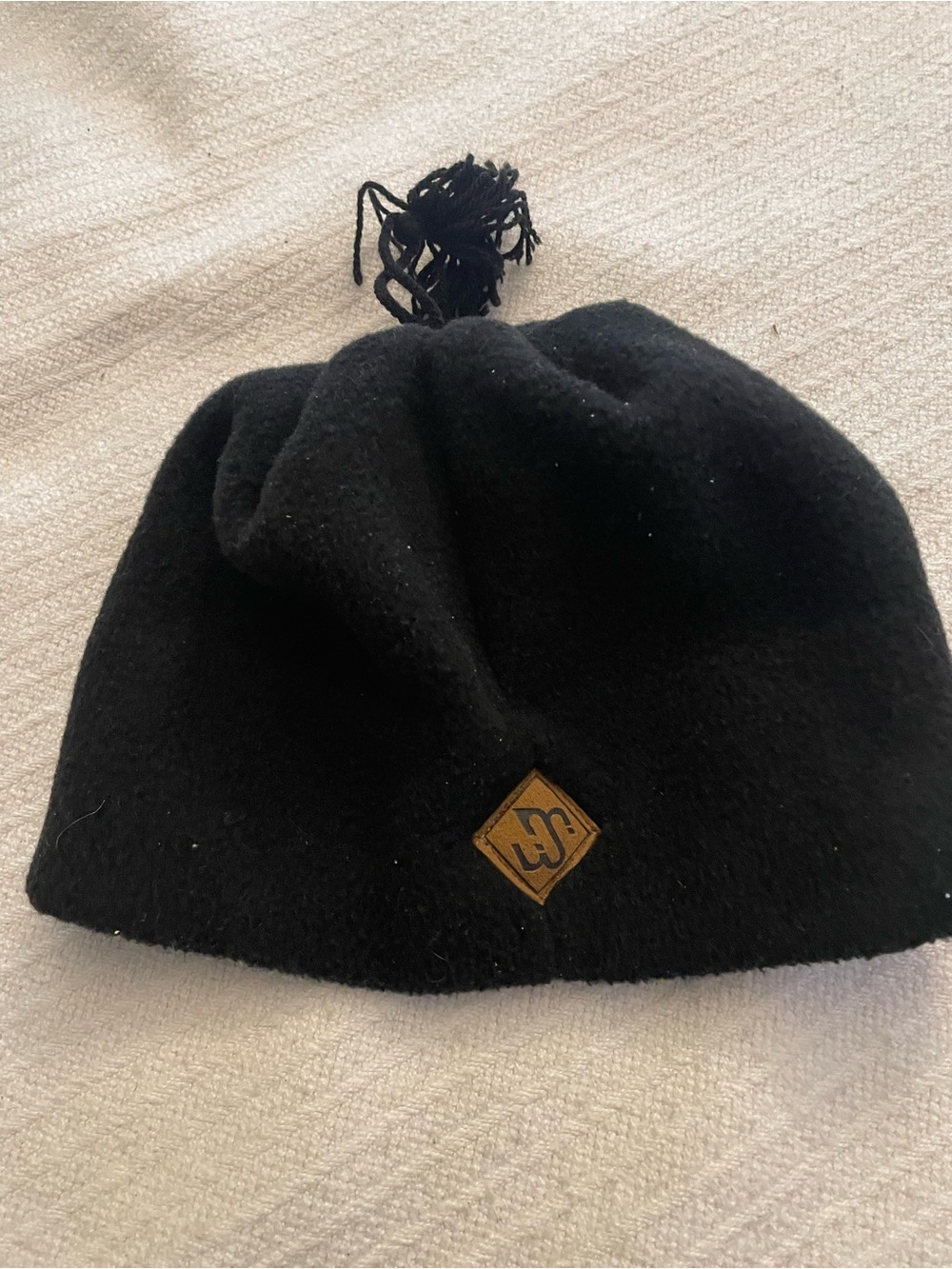 Black Knit Pom Beanie with Leather Logo Patch